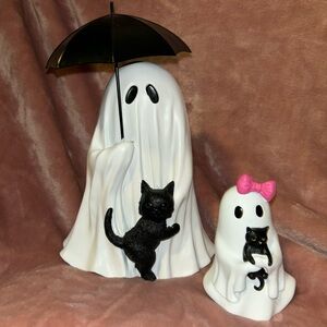Ghost holding cat bundle